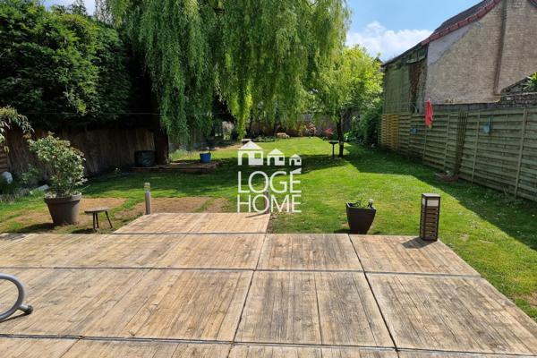 Maison de ville – 170 m² – 5 chambres – jardin sans vis-à-vis – garage traversant + cave à vendre