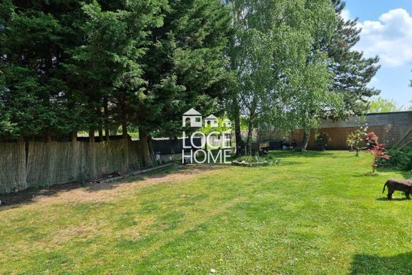 Maison de ville – 170 m² – 5 chambres – jardin sans vis-à-vis – garage traversant + cave à vendre