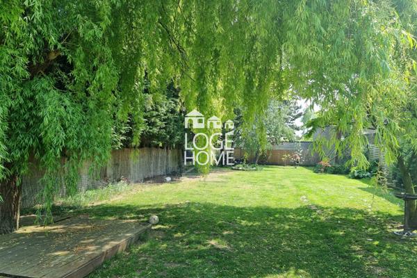 Maison de ville – 170 m² – 5 chambres – jardin sans vis-à-vis – garage traversant + cave à vendre