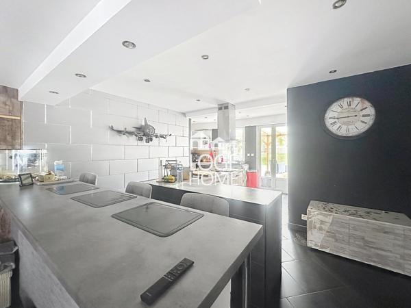Maison de ville – 170 m² – 5 chambres – jardin sans vis-à-vis – garage traversant + cave à vendre