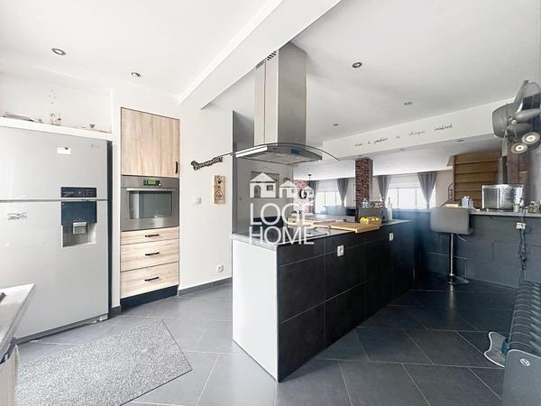Maison de ville – 170 m² – 5 chambres – jardin sans vis-à-vis – garage traversant + cave à vendre