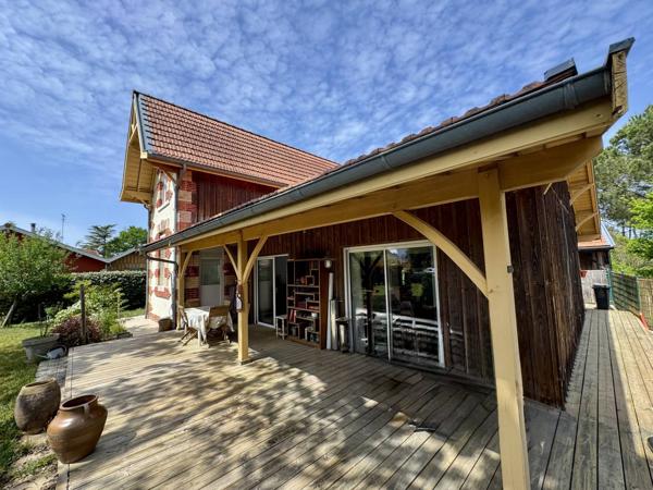 Maison à vendre à Lacanau Ville avec 4 chambres et terrain arboré proche commerces