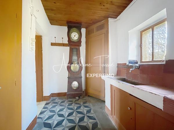 La Bastide-Pradines (12490) Maison de village à rénover et son garage avec jardin