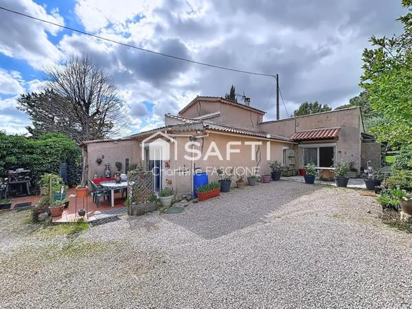 Maison à rénover avec grand terrain et potentiel