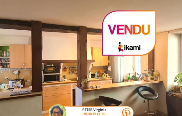 Maison de 90m2 environ avec jardin et garage, au centre du village