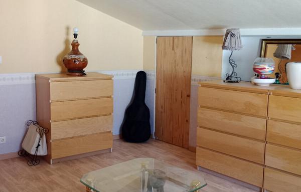 Maison de 90m2 environ avec jardin et garage, au centre du village