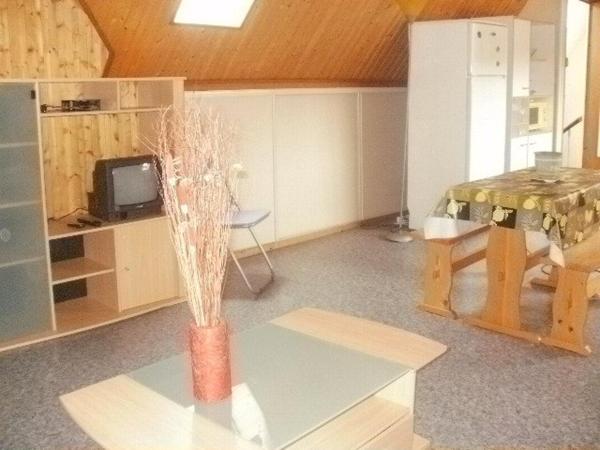 Investissement: IMMEUBLE de rapport 5.5 % environ. Composé de deux appartements et d'un fond de commerce