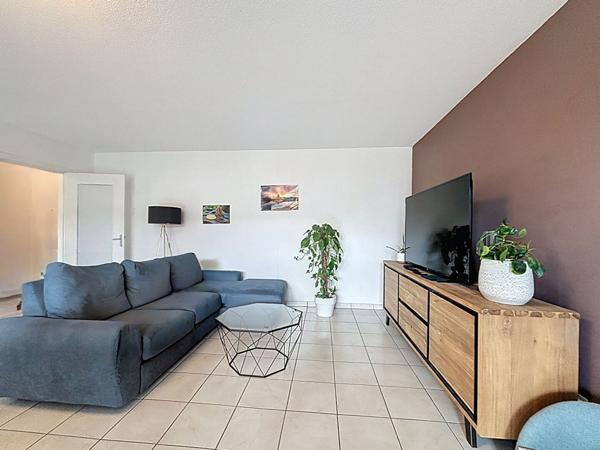 Spacieux appartement de type 3 de 77 m² avec garage, vue dégagée et ascenseur