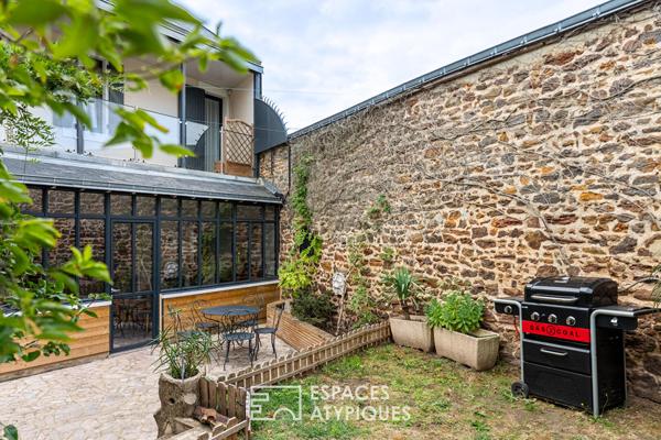 Maison de maître avec verrière et jardin clos