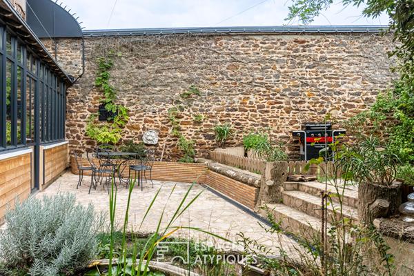 Maison de maître avec verrière et jardin clos
