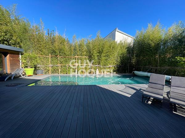 Élégante maison de 250 m² avec piscine, jardin paysagé et prestation haut de gamme !