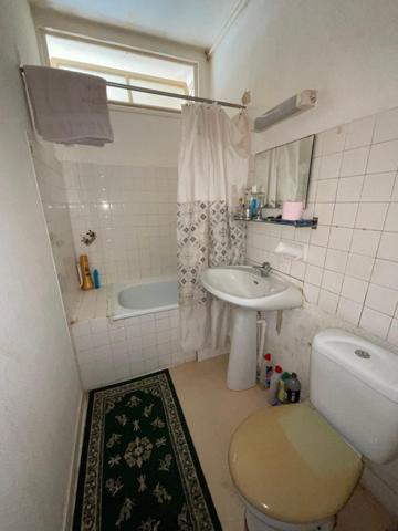 Centre-ville, immeuble 15 lots.