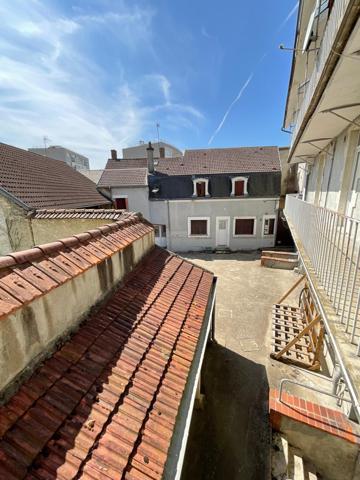 Centre-ville, immeuble 15 lots.