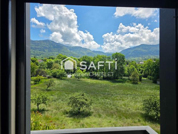 T3 fonctionnel avec jardin et parkings privatifs