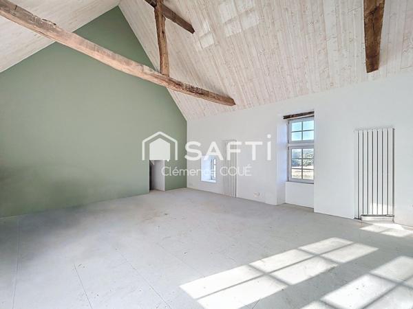 Magnifique longère en campagne de Bécon les granits