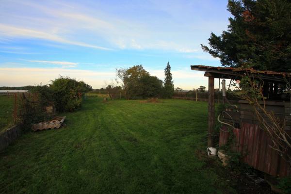 Maison de plain-pied, 4 chambres, sur une parcelle de 1600 m².