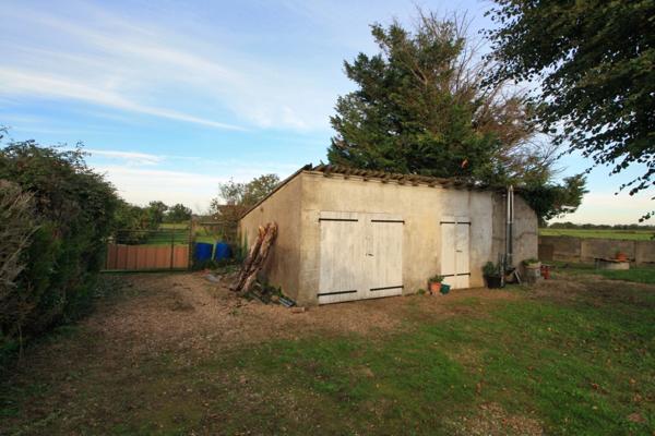 Maison de plain-pied, 4 chambres, sur une parcelle de 1600 m².