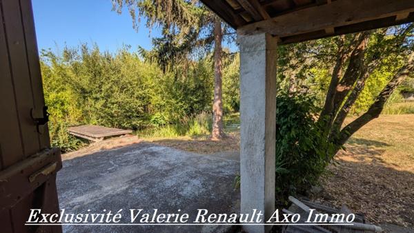 Maison T3 avec grand terrain arboré et grand plan deau