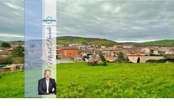 Dpt Rhône (69), au coeur de Pontcharra, terrain de 750 m2 totalement viabilisé pour 2 maisons.