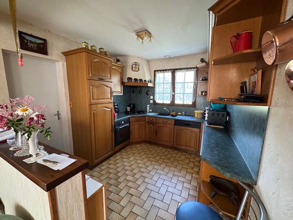 A vendre centre d'AMBON, maison individuelle avec garage et terrain clos de 602 m²