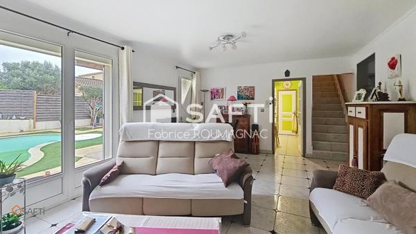 Maison de 118 m² avec piscine quatre faces et quatre chambres sur une parcelle de 556 m²