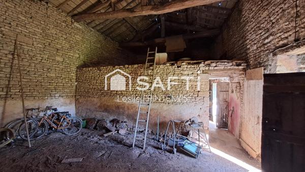Grange à rénover sur 1500 m² de terrain constructible