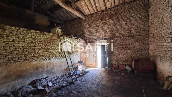 Grange à rénover sur 1500 m² de terrain constructible