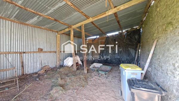 Grange à rénover sur 1500 m² de terrain constructible