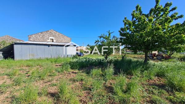 Grange à rénover sur 1500 m² de terrain constructible