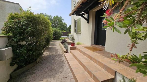 Villa T5 entièrement rénovée avec garage et jardin