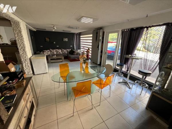 Maison à usage mixte de commerce et d'habitation de 5 pièces (environ 165 m²) située à proximité de