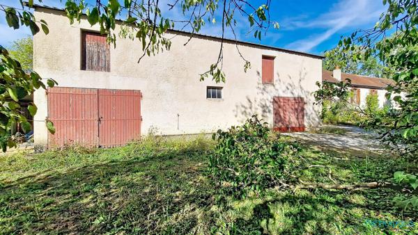 Ensemble immobilier sur terrain constructible de 35 ares