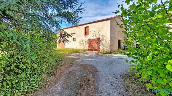 Ensemble immobilier sur terrain constructible de 35 ares