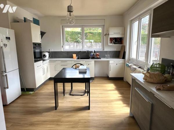 Rare maison de type T7 en cœur de ville paysager