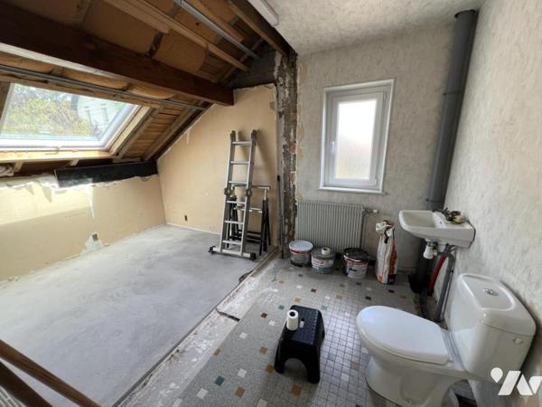 Rare maison de type T7 en cœur de ville paysager