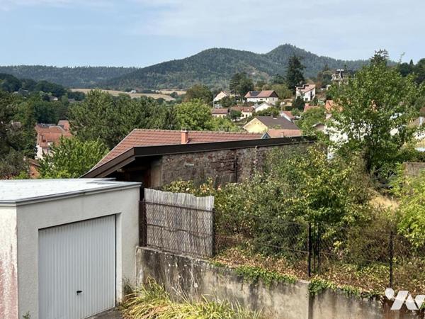 Rare maison de type T7 en cœur de ville paysager