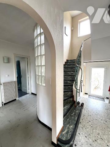 Rare maison de type T7 en cœur de ville paysager