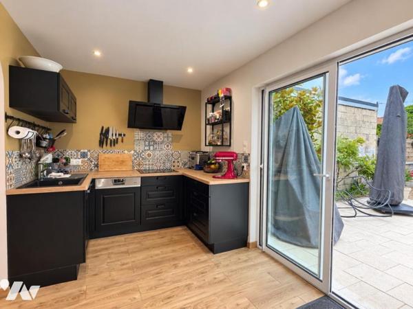 Maison de ville de 95 m² avec jardin, terrasse et garage – Excellent état