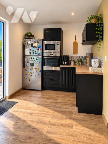 Maison de ville de 95 m² avec jardin, terrasse et garage – Excellent état