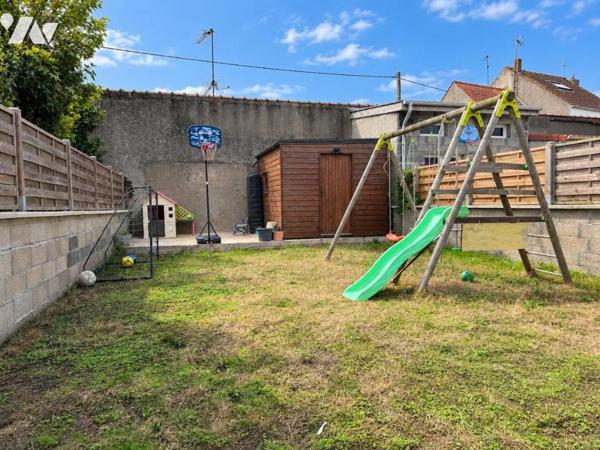 Maison de ville de 95 m² avec jardin, terrasse et garage – Excellent état
