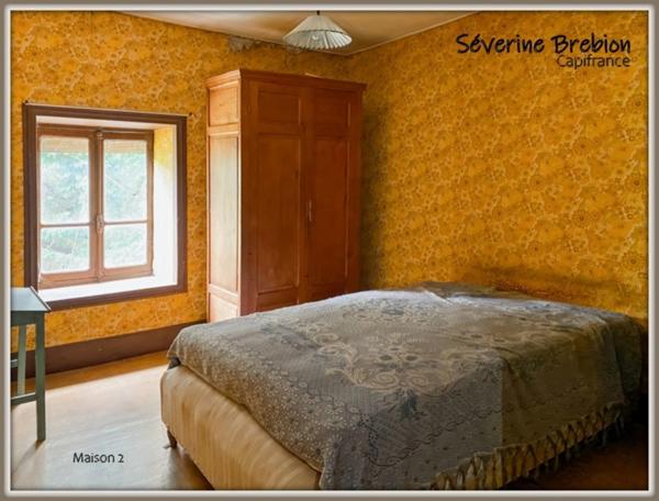 Ensemble immobilier composé de 2 maison et d'un jardin LA MONNERIE LE MONTEL (63)