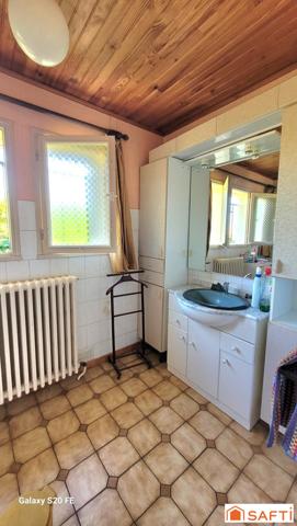 Pavillon INDIVIDUEL de 113m² habitable de PLAIN PIED très LUMINEUX avec SOUS SOL COMPLET et parcelle d'environ 1800m²