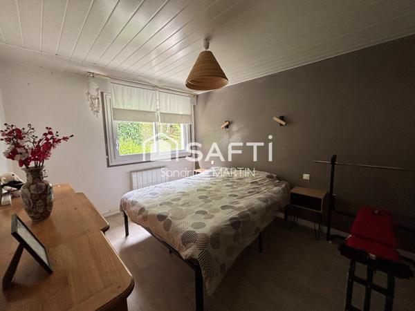 Appart T3 RDC surélevé, 77m2, cave et parking.