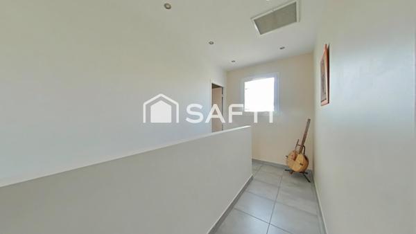 Maison familiale 4 chambres dont une suite parentale- 3 faces- garage- quartier des "Meravelles"