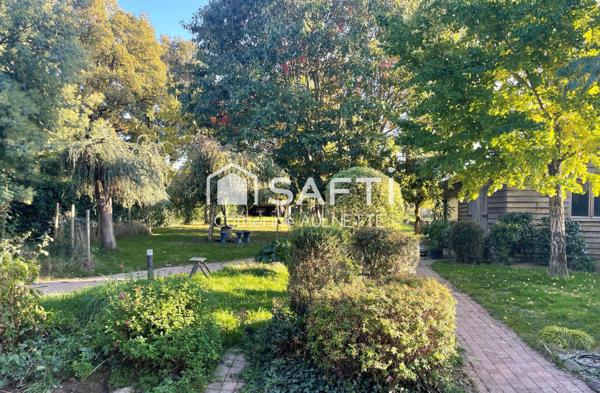 Maison lumineuse de 143m² sur grand jardin arboré