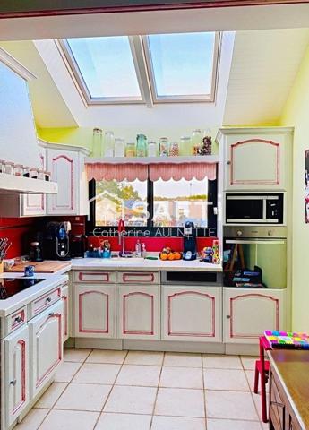 Maison lumineuse de 143m² sur grand jardin arboré