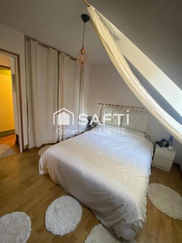 Maison lumineuse de 143m² sur grand jardin arboré