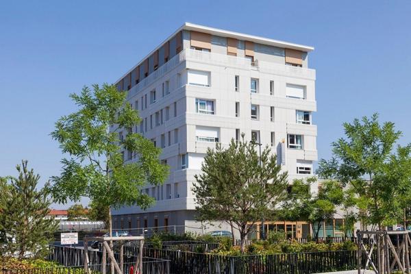 INVESTISSEMENT LOCATIF – ANNEMASSE – Résidence de Tourisme Nehô Suites – Porte de Genève – 6,12 % de rentabilité