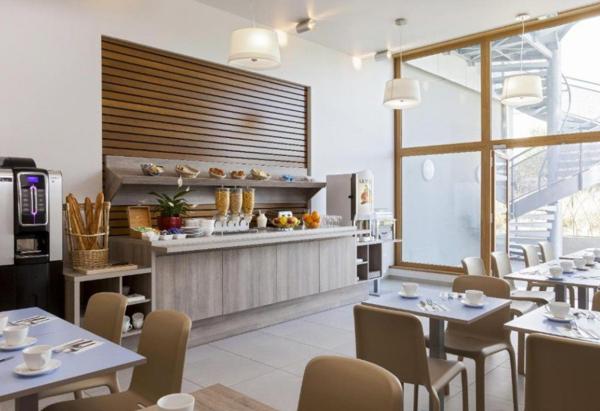 INVESTISSEMENT LOCATIF – ANNEMASSE – Résidence de Tourisme Nehô Suites – Porte de Genève – 6,12 % de rentabilité