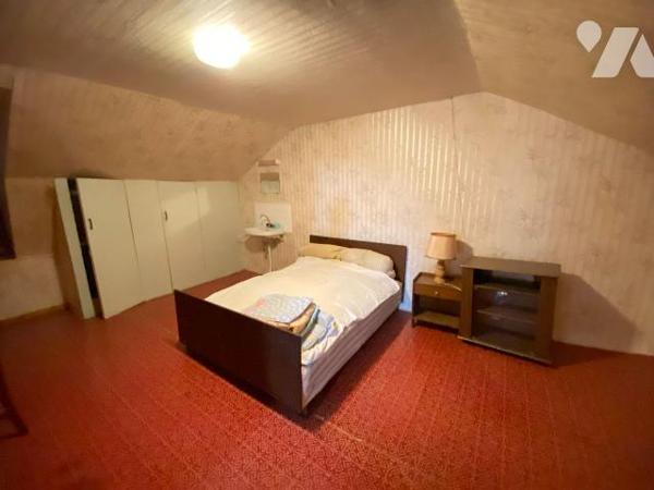 RAULHAC, sur parcelle de 200 m², maison de bourg comprenant sous-sol cave, atelier, garage - RD...